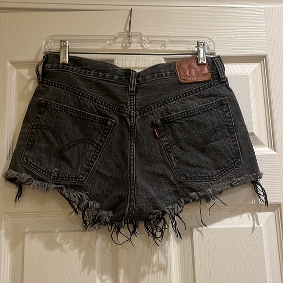 Levi’s black denim shorts with distressing - Picture 2 of 2